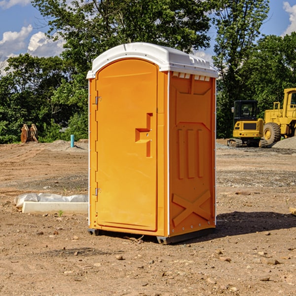 how often are the portable restrooms cleaned and serviced during a rental period in Okanogan County